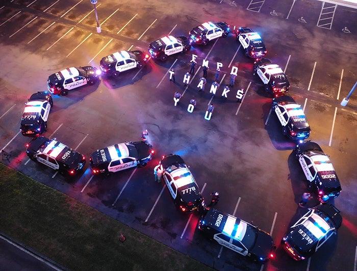 Fort Myers Police Department (FMPD) use there cars to create a large heart