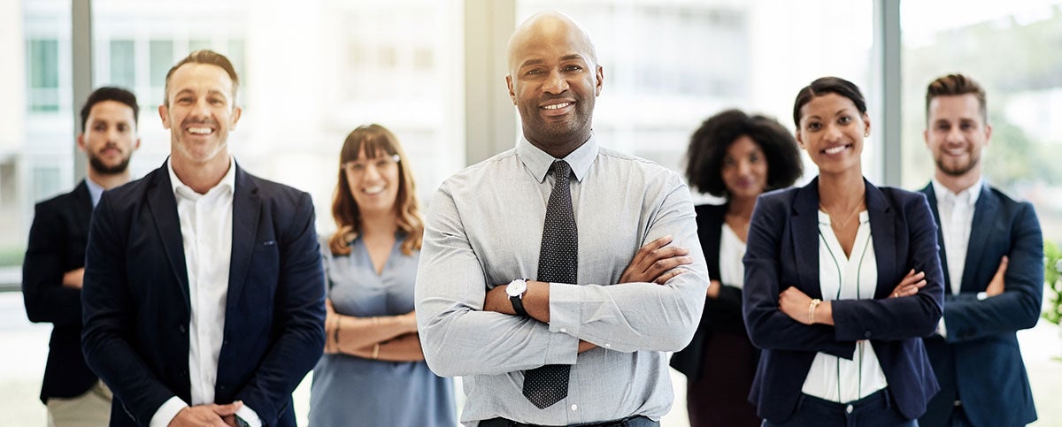 group of business people looking at camera